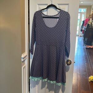 Great little dress with a little stretch Great details at hem and arms. 37” long